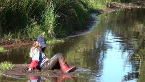 mudding-in-red-nokian-rubberbo_12.jpg
