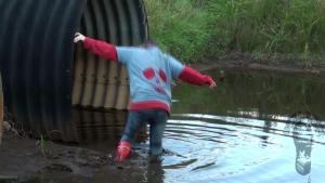 mudding-in-red-nokian-rubberbo_4.jpg