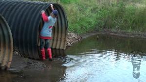 mudding-in-red-nokian-rubberbo_6.jpg