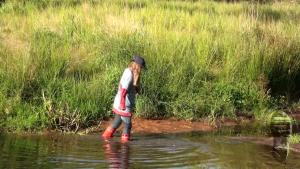 mudding-in-red-nokian-rubberbo_7.jpg