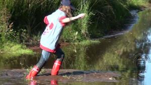 mudding-in-red-nokian-rubberbo_9.jpg
